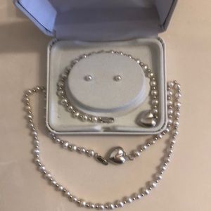 White pearl set with sterling heart